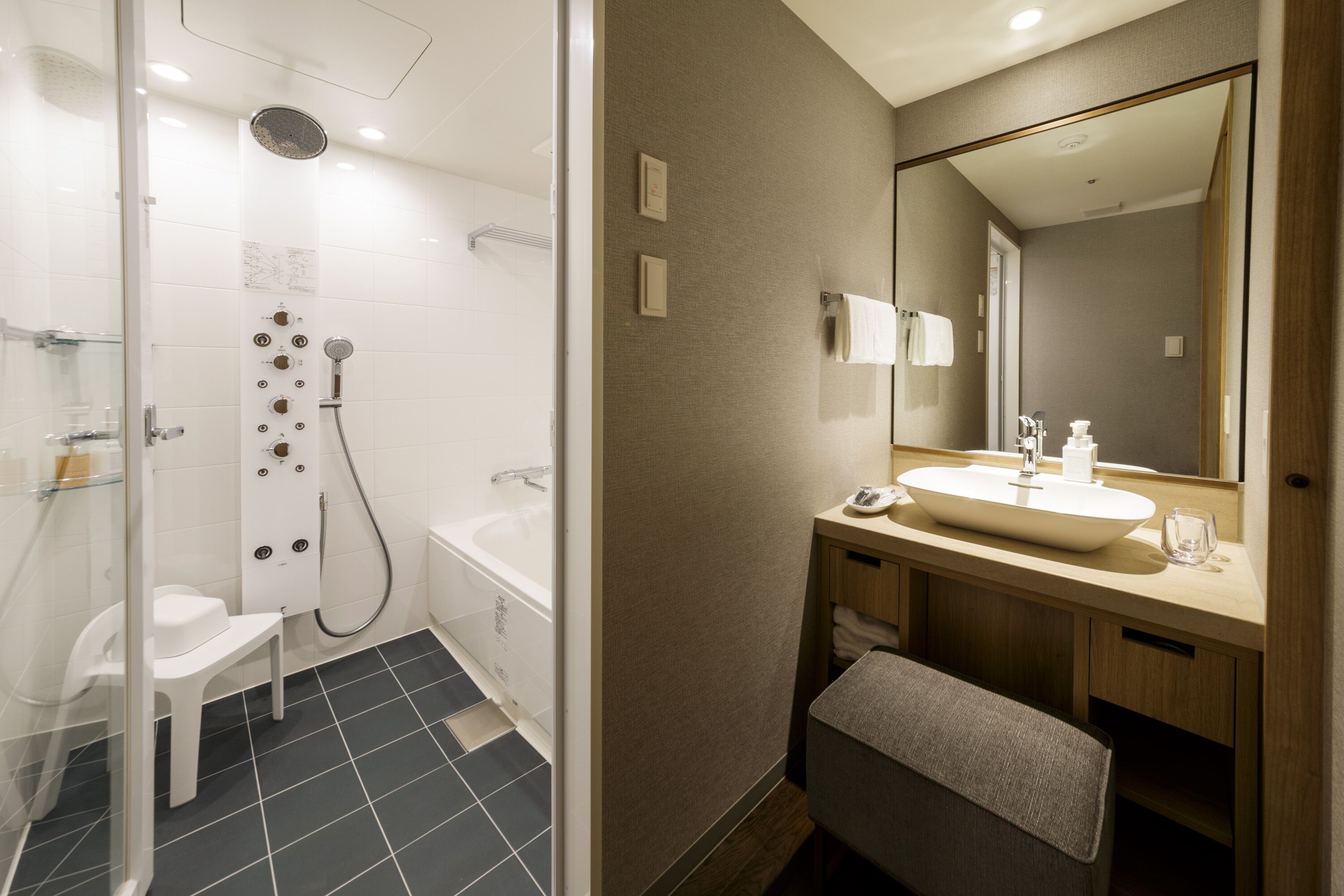 combined shower/bathtub, free toiletries, hair dryer, slippers