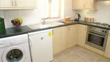 Rumah, beberapa kamar | Dapur pribadi | Lemari es besar, microwave, oven, dan kompor