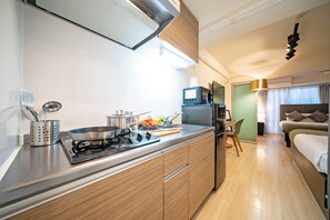 1 Bedroom Apartment | Private kitchen | Fridge, microwave, stovetop, electric kettle - Grandouce Shinkitano (Osaka)