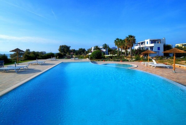 Outdoor pool, pool umbrellas, pool loungers