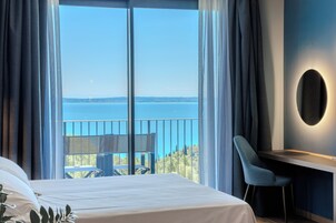 Colchones con acolchado adicional, minibar, caja fuerte y escritorio