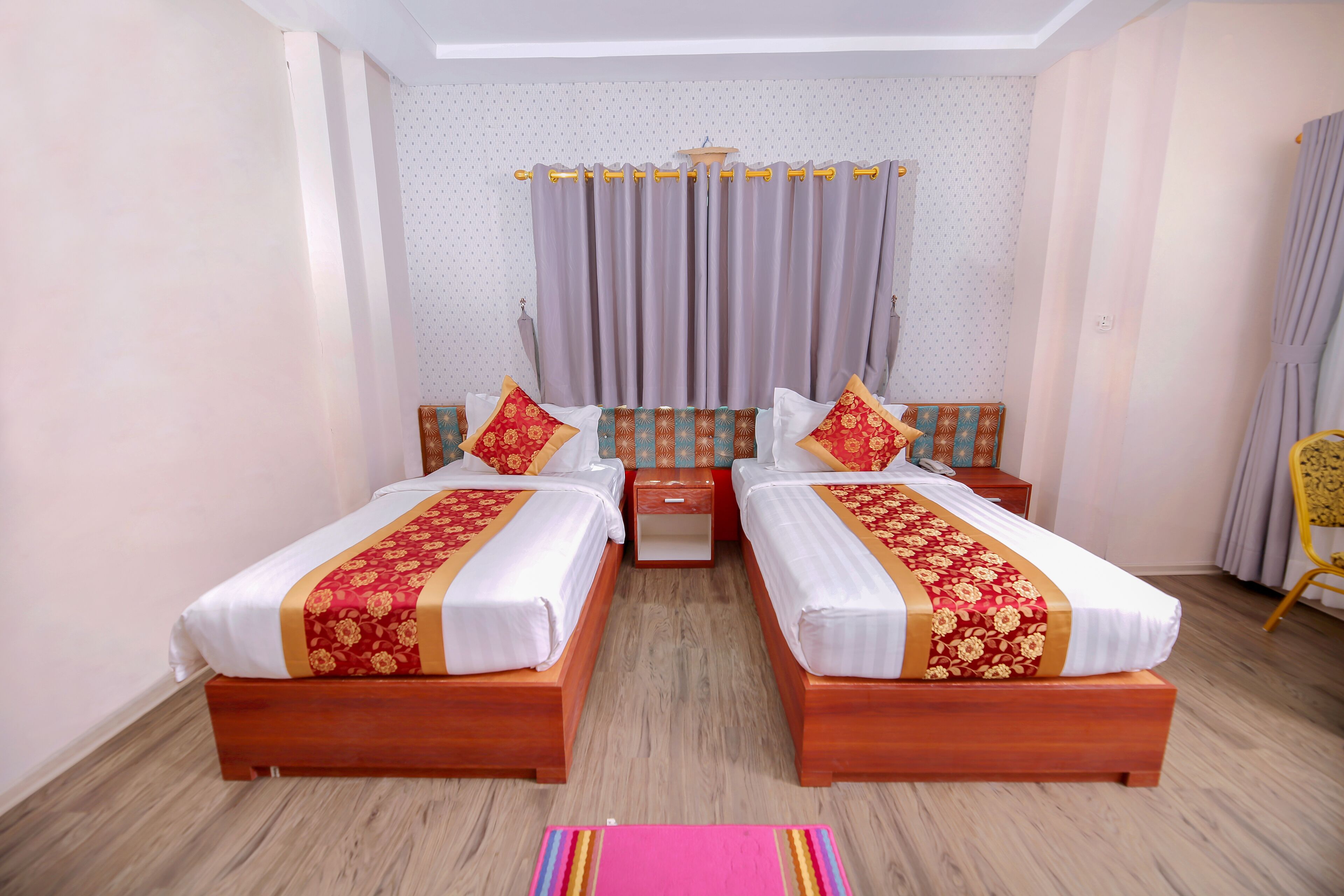 Deluxe Double or Twin Room | Minibar, in-room safe, desk, blackout drapes