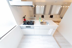 Studio Apartment | Private kitchenette | Fridge, microwave, stovetop, electric kettle