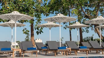 Outdoor pool, pool umbrellas, pool loungers