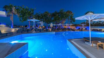 Outdoor pool, pool umbrellas, pool loungers