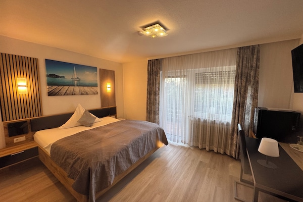 Comfort Double Room | Minibar, in-room safe, desk, laptop workspace