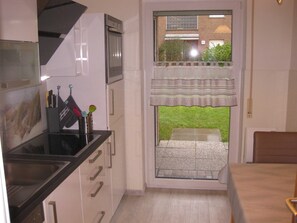 Kjøleskap, mikrobølgeovn, ovn og oppvaskmaskin