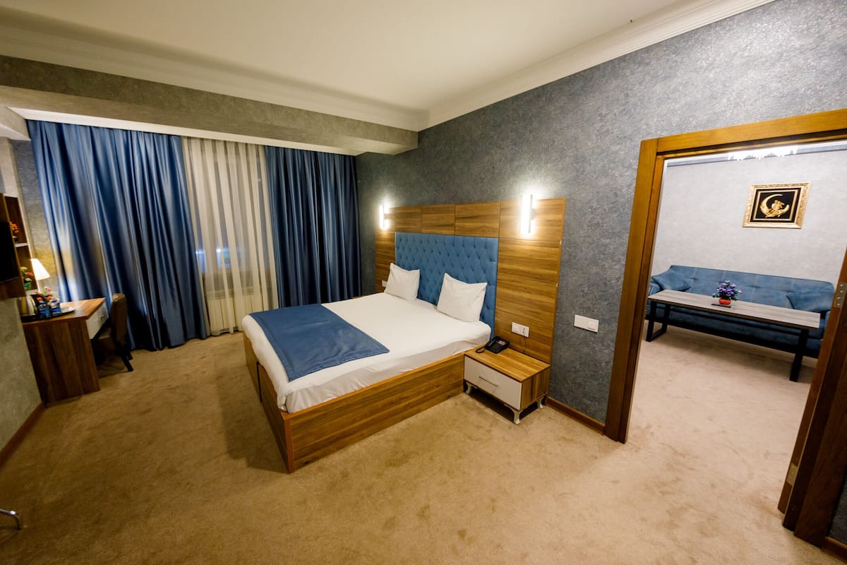 Family Double Room | 1 bedroom, premium bedding, minibar, in-room safe