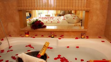 Separate tub and shower, bathrobes, towels, soap