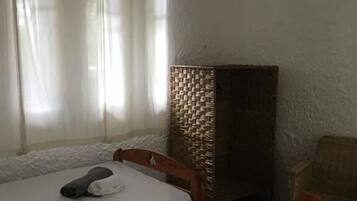 Desk, laptop workspace, bed sheets