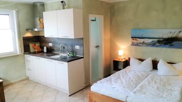 Basic Studio, Patio, Beachfront | 1 bedroom, free WiFi