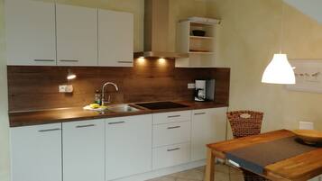 Appartement, 1 chambre, terrasse, en front de plage | Restauration dans la chambre