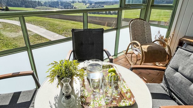 A high-rise room with a panoramic view of a green landscape. - Bergliebe (G 103) by Interhome (Dittishausen)