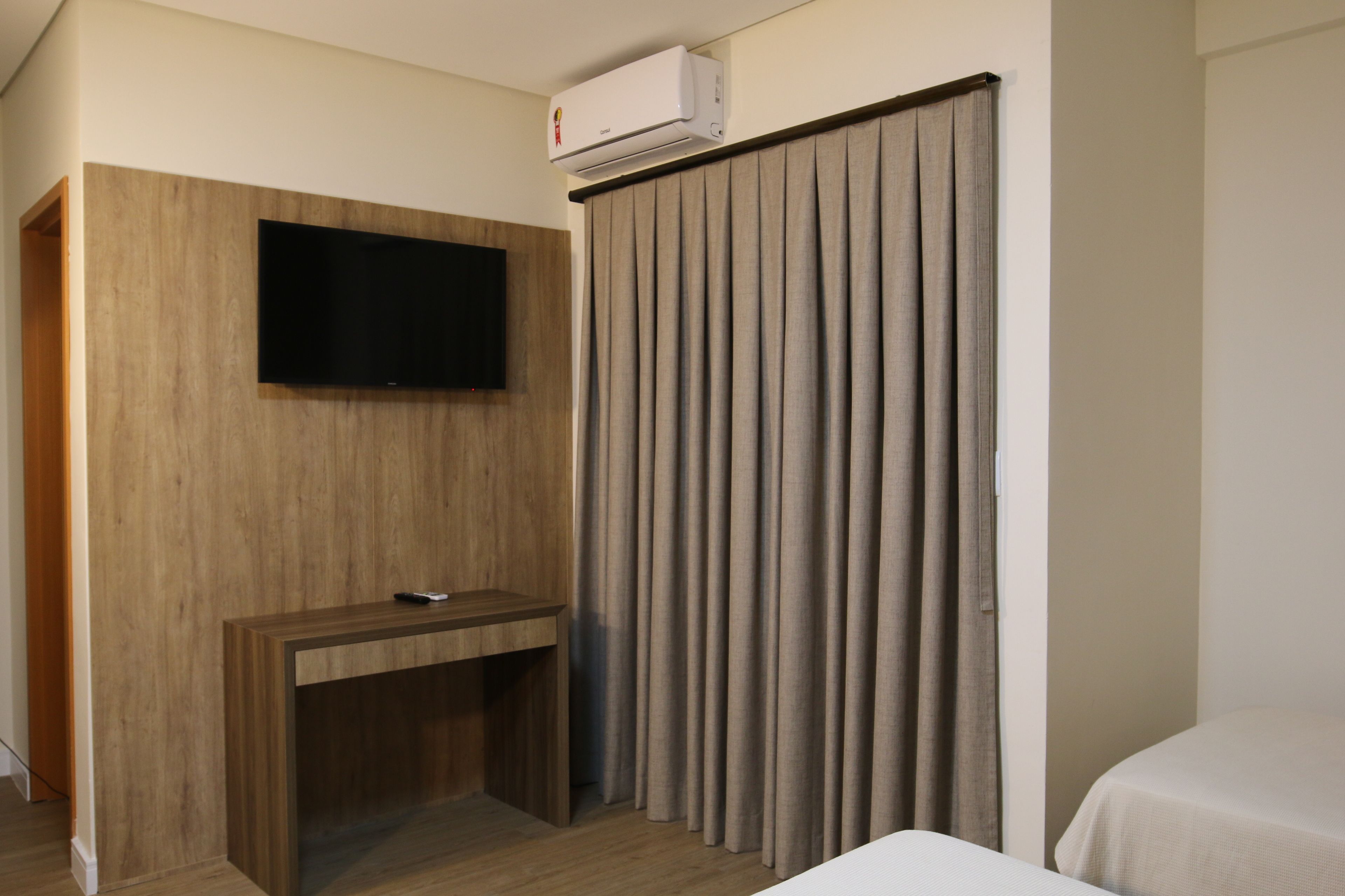 deluxe quadruple room | minibar, desk, blackout curtains, free wifi