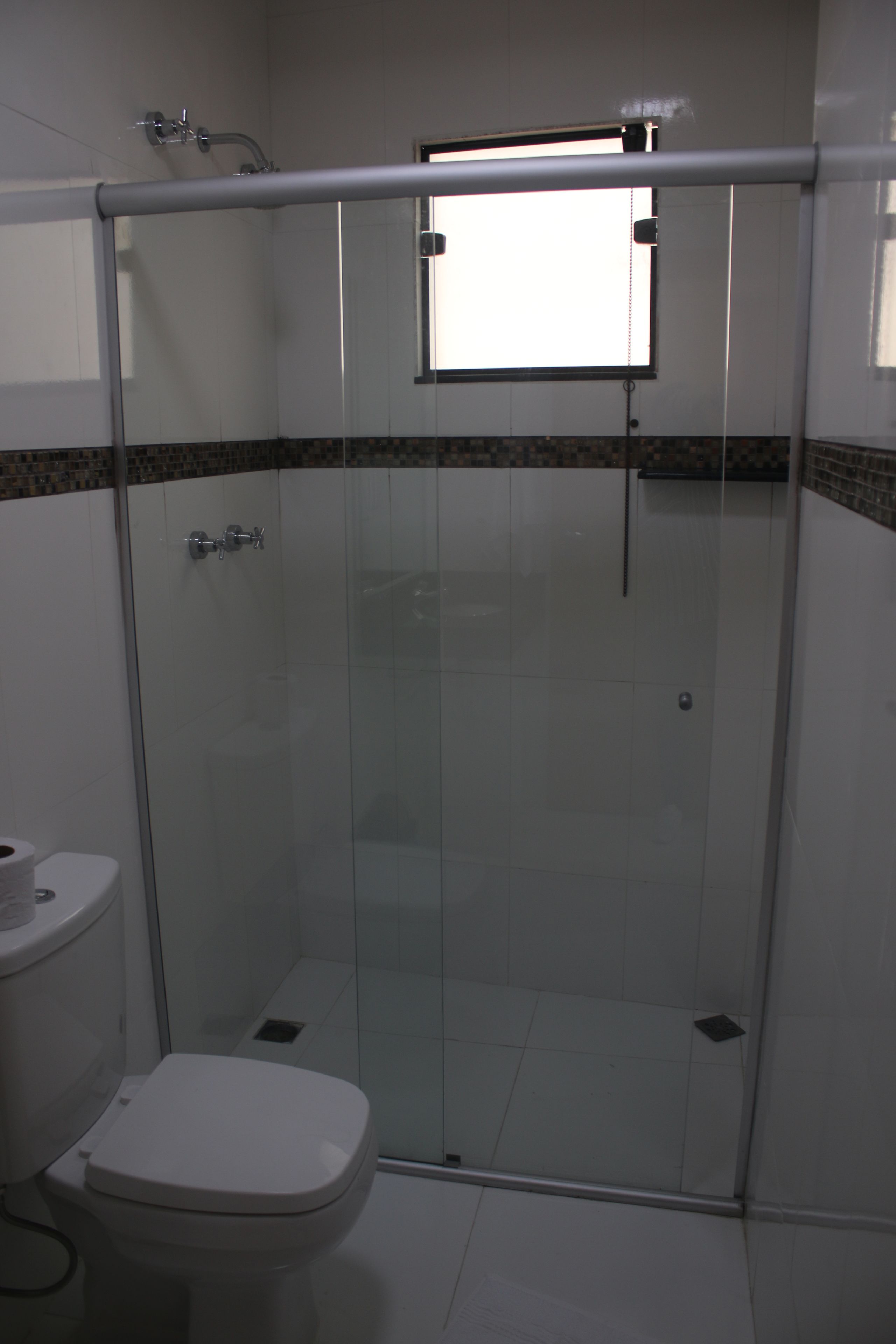 shower, rainfall showerhead, hair dryer, towels