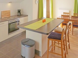 Fridge, oven, cookware/dishes/utensils