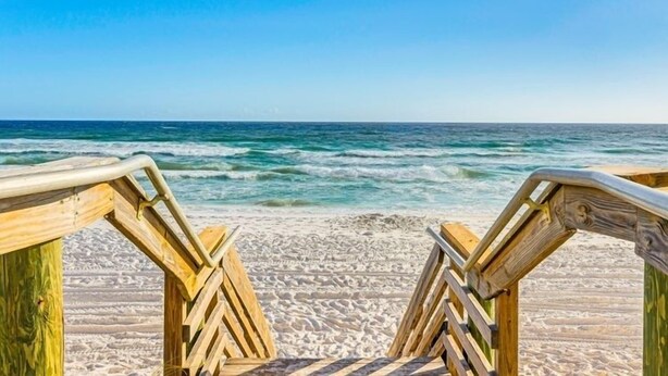 A wooden beach walkway leading to the ocean. - Spacious, Relaxing, Family-Friendly Townhouse Retreat Steps from Pool & Beach (Destin)