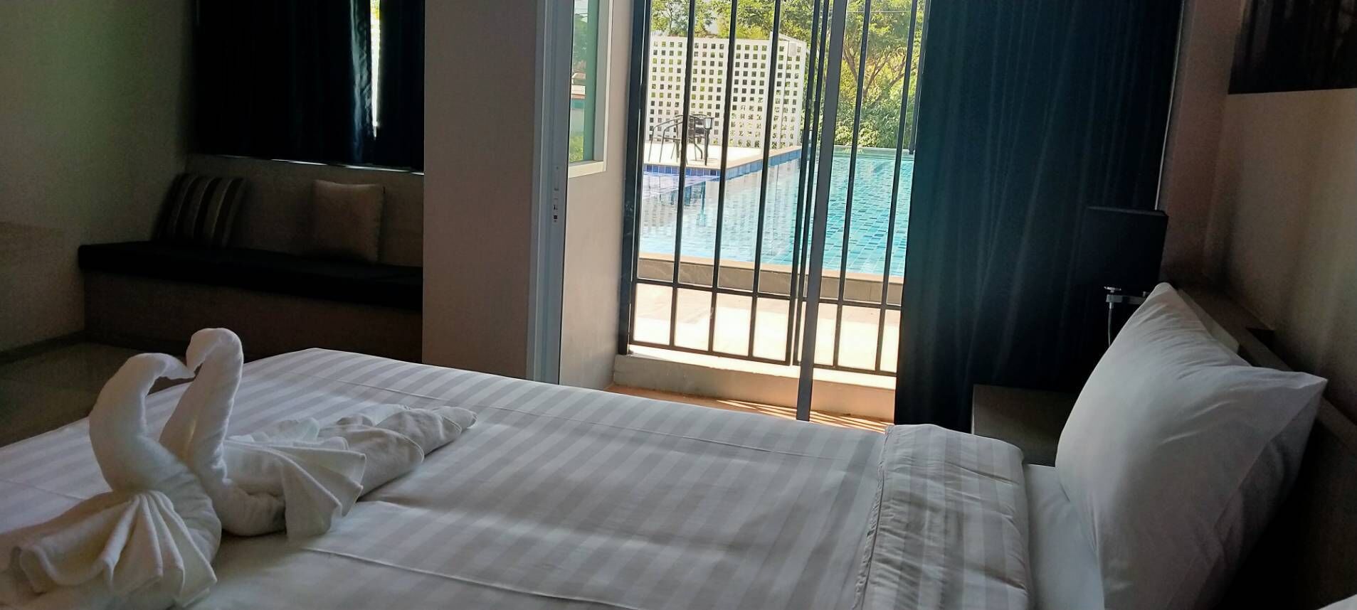 family pool room | blackout curtains, rollaway beds, free wifi, bed sheets