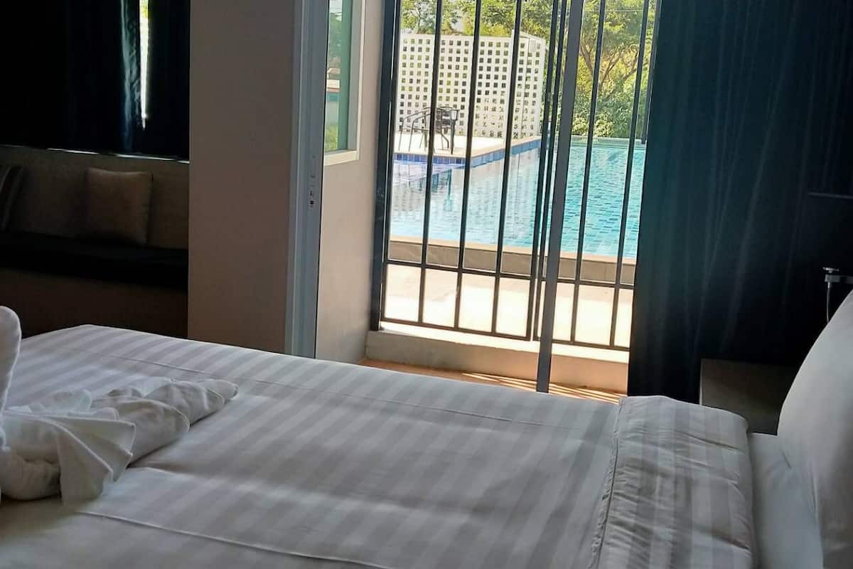 family pool room | blackout curtains, rollaway beds, free wifi, bed sheets