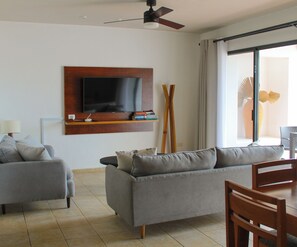 Apartamento conforto | Área de estar | TV de tela plana