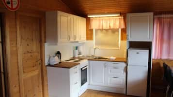 Cottage, 2 Bedrooms | Private kitchen | Full-sized fridge, microwave, oven, stovetop