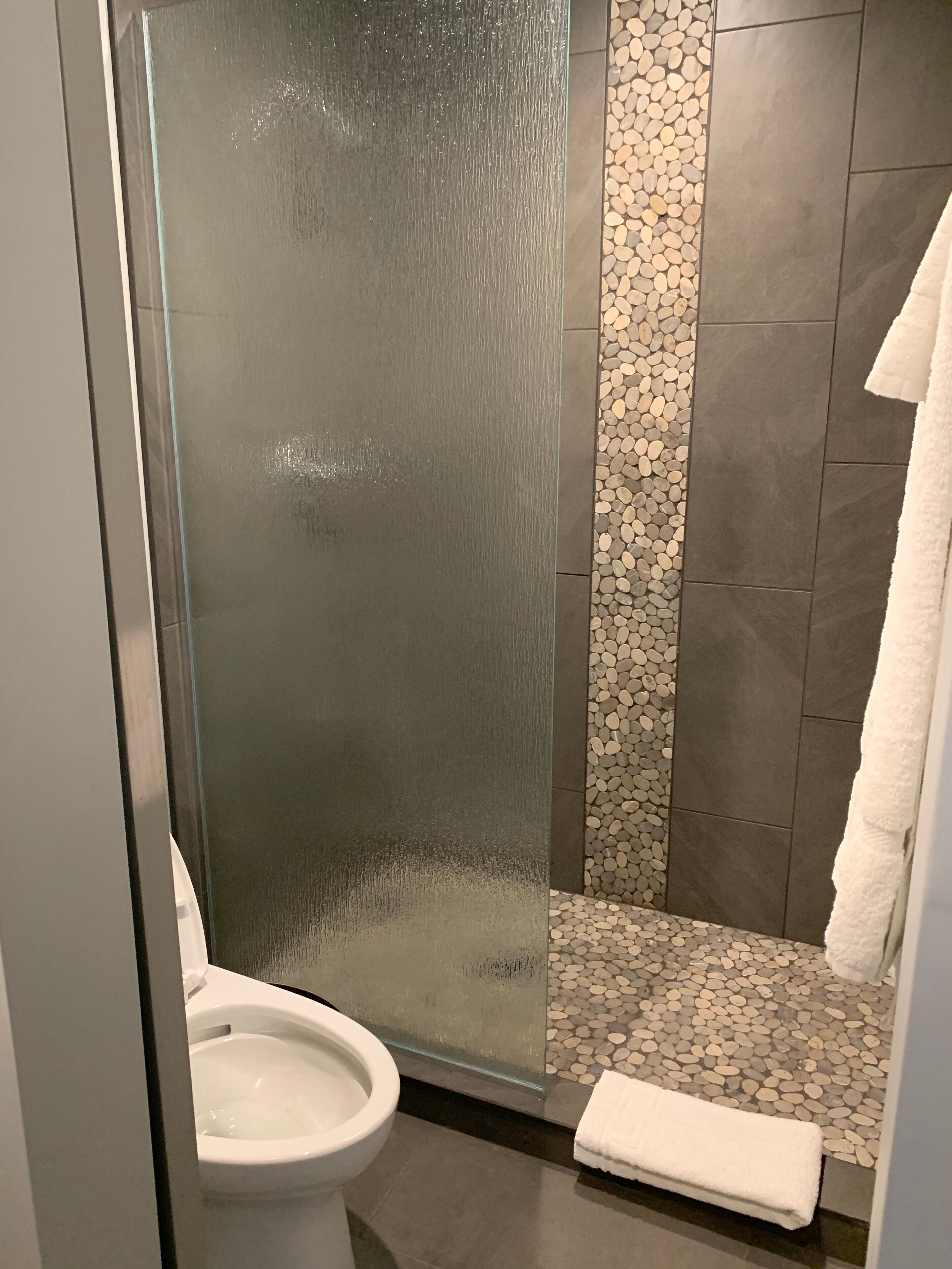 shower, free toiletries, towels, soap