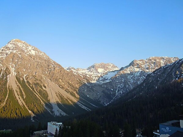 A mountain landscape with a clear sky.