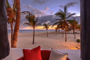On the beach, sun-loungers, beach towels