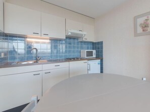 Fridge, microwave, highchair, cookware/dishes/utensils