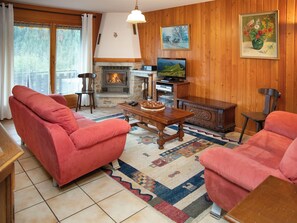 Flat-screen TV, fireplace, DVD player, table football