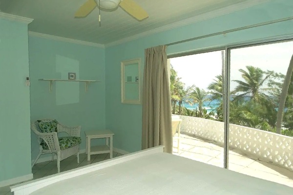 2nd bedroom looks out on to the porch and out to the ocean