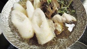 A bowl of soup with various ingredients. - Kurion (Senboku)