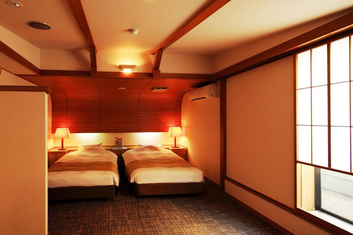 Twin Room , Non smoking | In-room safe, desk, laptop workspace, iron/ironing board (on request)