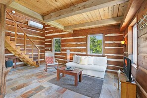 Upon entering the home the living room is to the right - Charming Custom Log Cabin - Perfect for Stargazers and Day-Trippers! (Fischer)