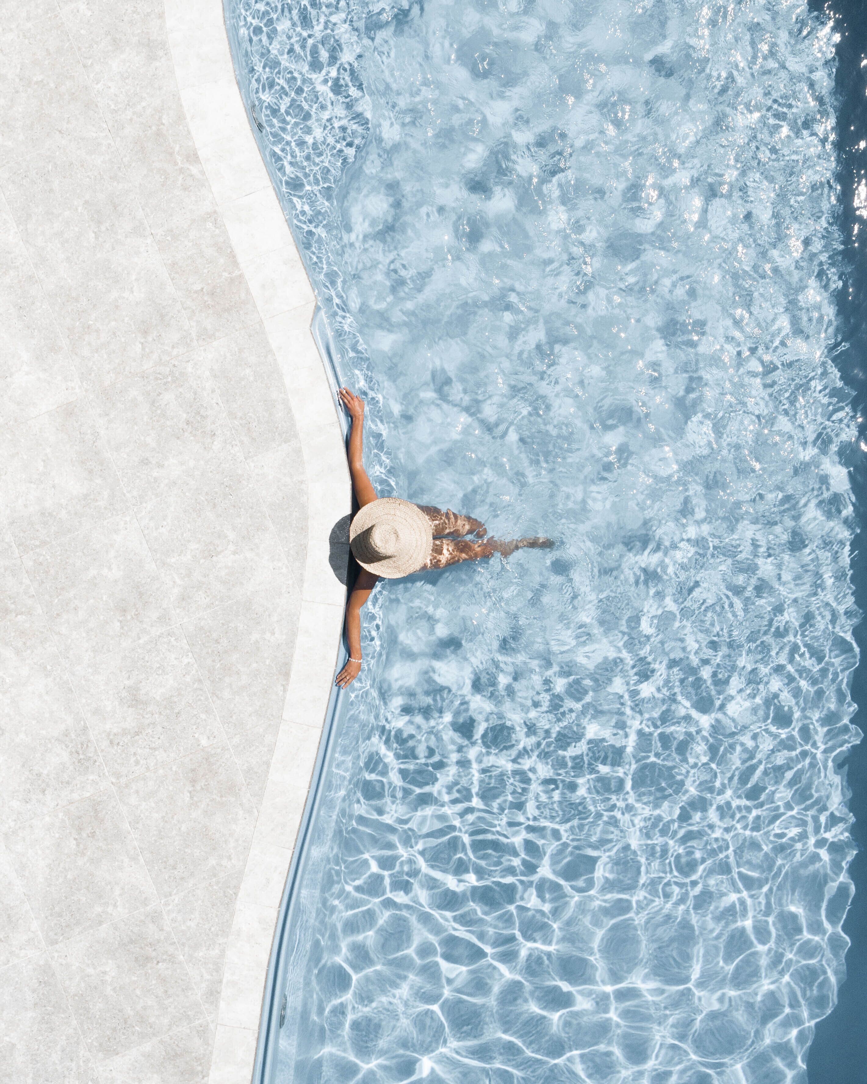 2 outdoor pools, open 8:00 AM to 7:30 PM, pool umbrellas, pool loungers