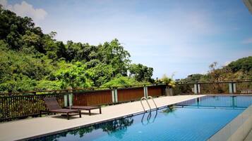 Outdoor pool, pool umbrellas, pool loungers