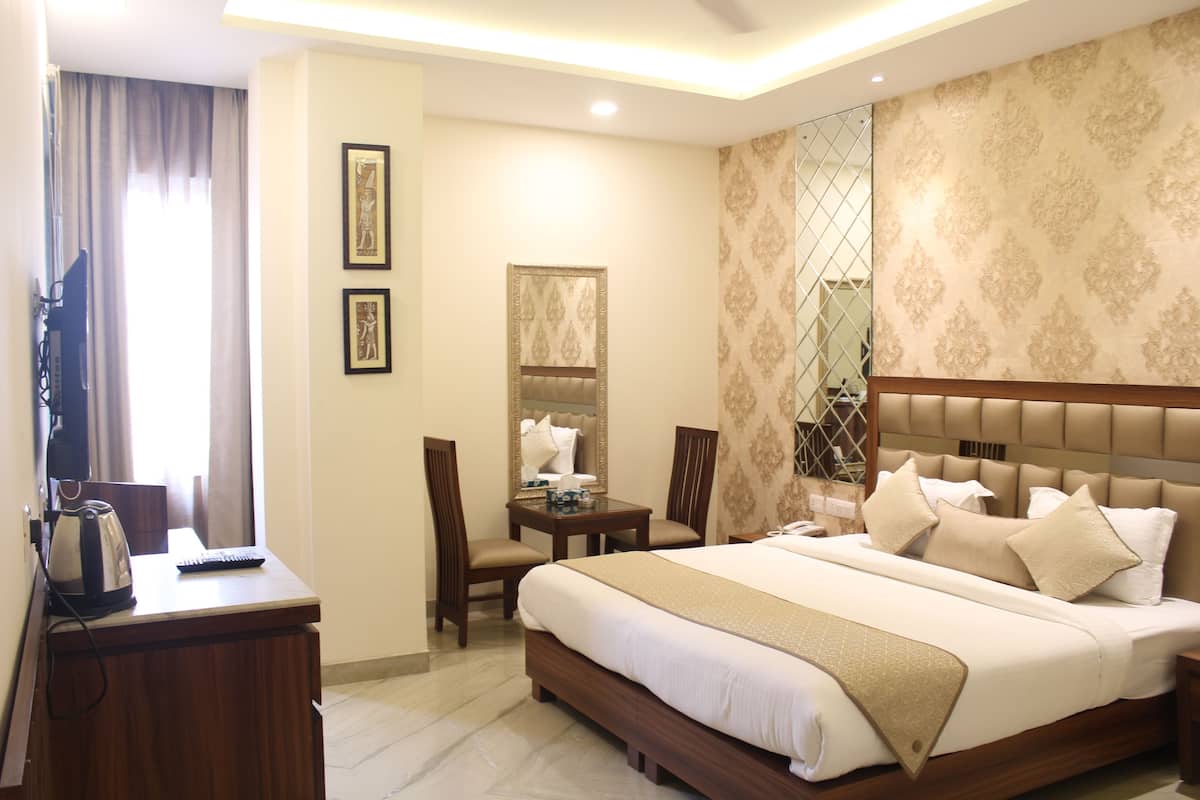 Premium bedding, memory-foam beds, minibar, in-room safe