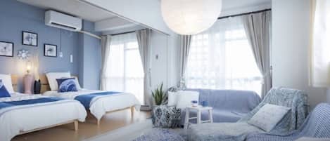 Apartemen | Area keluarga | TV layar datar dan pemutar DVD