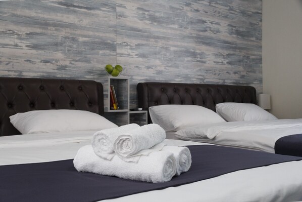 Familiesuite, 1 soverom | Allergitestet sengetøy, blendingsgardiner og strykejern/-brett