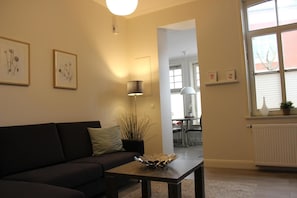 Apartment (Hooge) | Living area | Flat-screen TV, fireplace, DVD player