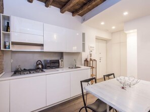 Fridge, microwave, cookware/dishes/utensils, dining tables - Forum Augusti by Interhome (Rome: Historical City Center)