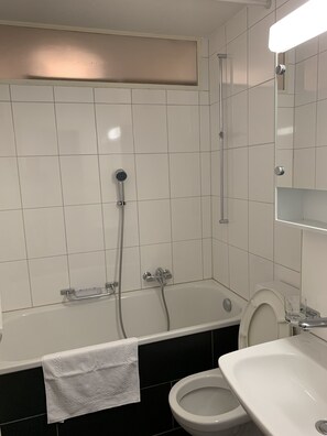 Apartment, 1 Bedroom | Bathroom | Deep-soaking bathtub, bidet, towels