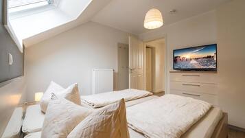 Apartemen (Langeneß) | 1 kamar tidur, ruang kerja ramah laptop, dan tempat tidur bayi gratis