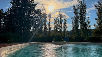 Seasonal outdoor pool, pool umbrellas, sun loungers