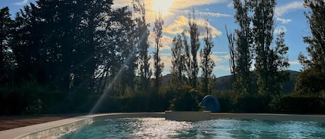Seasonal outdoor pool, pool umbrellas, sun loungers
