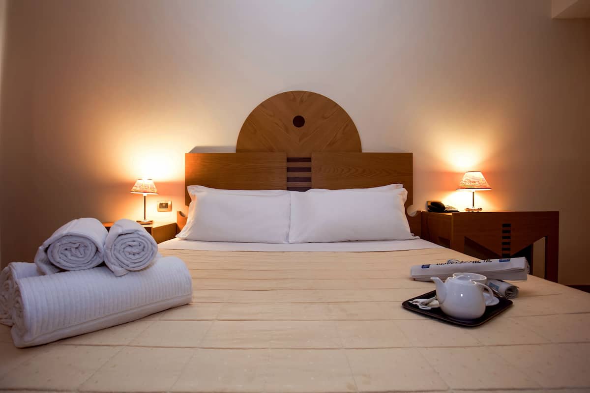 Frette Italian sheets, premium bedding, down comforters, pillowtop beds