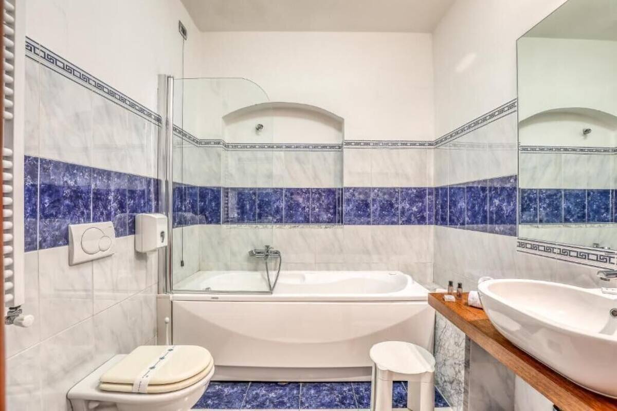 Shower, free toiletries, hair dryer, slippers