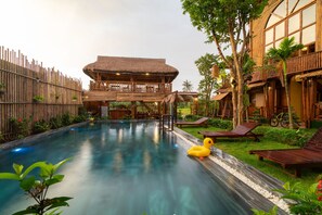 Outdoor pool, pool umbrellas, pool loungers