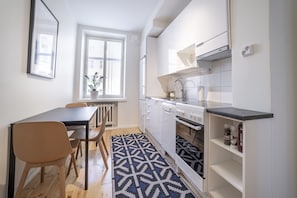 Studio, City View | Private kitchen | Fridge, microwave, oven, stovetop