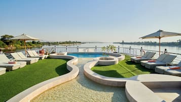 Outdoor pool, pool umbrellas, pool loungers